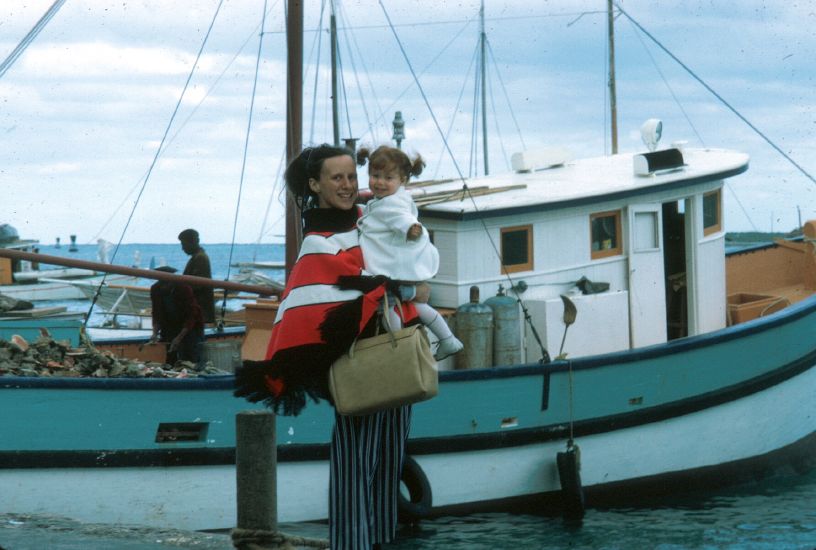  in front of conch boat in Bahamas